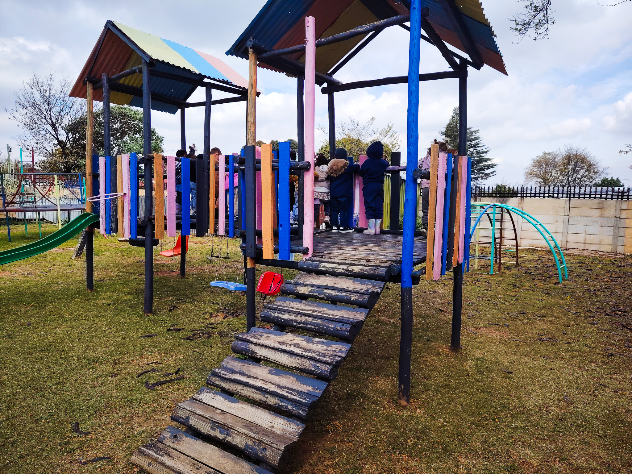 Children enjoying outdoor garden time at Daddy Daycare, Roodepoort